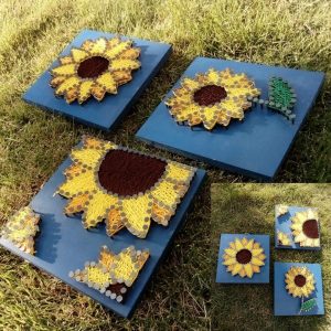 Three 6x6 string art frames showcasing blooming sunflowers in vibrant threads.